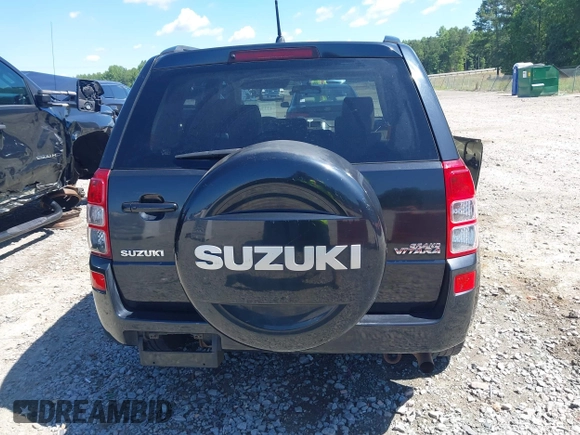 2009 Suzuki Grand Vitara z VIN JS3TE047094100192, wystawiony jako IAAI lot #42336959 z przebiegiem 244 995 mil mil oraz . Historia ofert i sprzedaży dostępna na DreamBid. Obrazek 16.