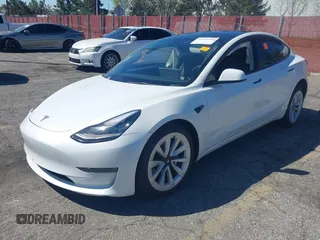 2022 Tesla Model 3 Long Range with VIN 5YJ3E1EB7NF298456, listed as a IAAI auction lot 41859304 with Not Provided miles and . Bid and sale history available at DreamBid. Image 2.