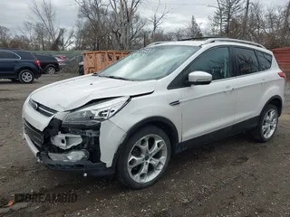 2013 Ford Escape Titanium with VIN 1FMCU0J96DUD85315, listed as a IAAI auction lot 41934204 with 152,132 mi miles and . Bid and sale history available at carsss.com. Image 2.