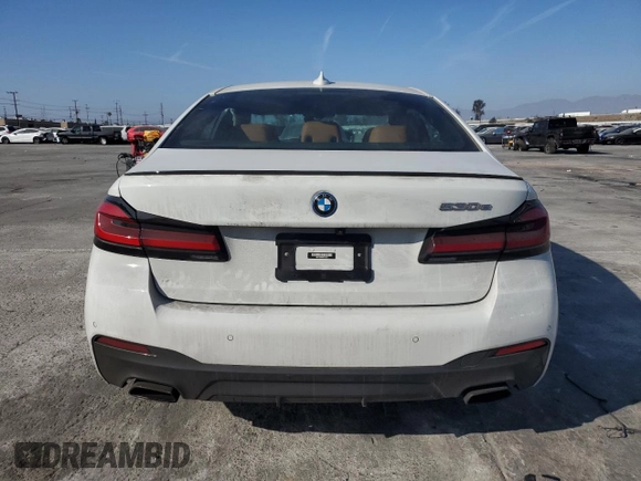 2023 BMW 5 Series 530e with VIN WBA13AG02PCL73814, listed as a Copart auction lot 86818824 with Not provided miles and Salvage title. Bid and sale history available at DreamBid. Image 6.