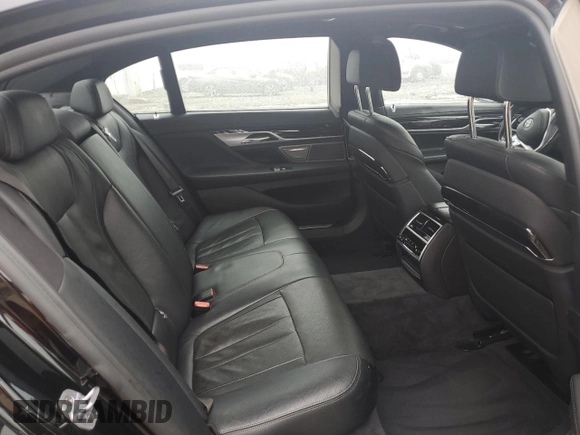 2019 BMW 7 Series 740i xDrive z VIN WBA7E4C52KGV28841, wystawiony jako Copart lot #56567375 z przebiegiem 162 220 mil mil oraz Szkoda całkowita • Salvage title. Historia ofert i sprzedaży dostępna na DreamBid. Obrazek 10.