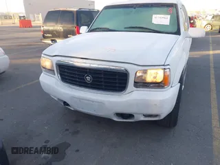 2000 Cadillac Escalade z VIN 1GYEK13R8YR146809, wystawiony jako IAAI lot #41753964 z przebiegiem 156 376 mil mil oraz . Historia ofert i sprzedaży dostępna na DreamBid. Obrazek 6.
