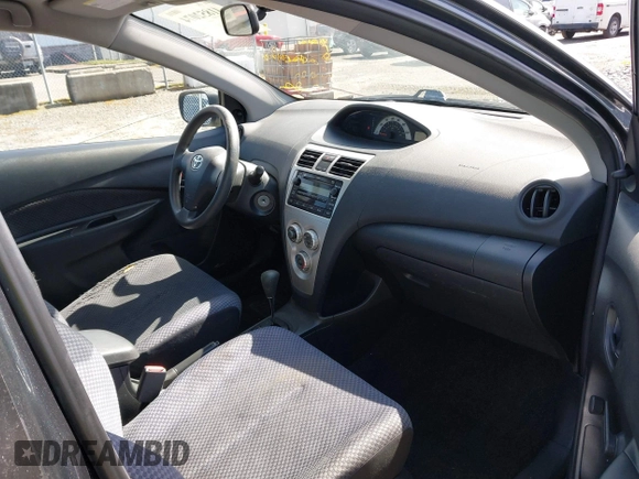 2007 Toyota Yaris with VIN JTDBT923371009887, listed as a IAAI auction lot 41852074 with 147,039 mi miles. Bid and sale history available at carsss.com. Image 5.