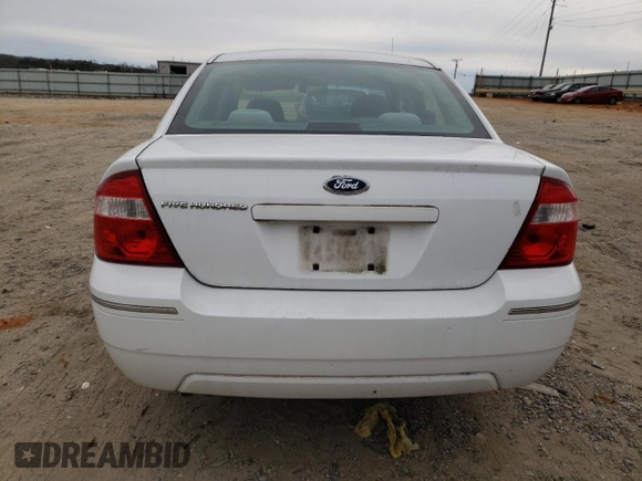 2005 Ford Five Hundred SE z VIN 1FAFP231X5G165841, wystawiony jako Copart lot #43117535 z przebiegiem 154 874 mil mil oraz Czysty tytuł • Clean title. Historia ofert i sprzedaży dostępna na DreamBid. Obrazek 6.