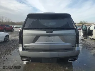 2021 Cadillac Escalade Premium Luxury with VIN 1GYS4BKL8MR197141, listed as a Copart auction lot 41915145 with 104,603 mi miles and Salvage Title. Bid and sale history available at carsss.com. Image 6.