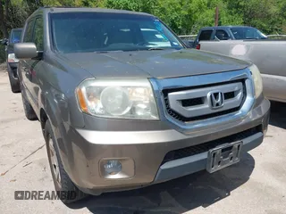 2011 Honda Pilot Touring with VIN 5FNYF4H94BB021952, listed as a IAAI auction lot 41985940 with 170,043 mi miles. Bid and sale history available at carsss.com. Image 11.