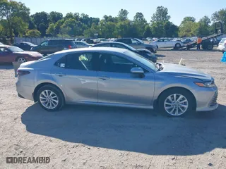 2024 Toyota Camry LE with VIN 4T1C11AK4RU194873, listed as a IAAI auction lot 40269603 with 5,619 mi miles. Bid and sale history available at carsss.com. Image 13.