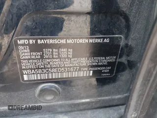 2014 BMW 5 Series 535i xDrive with VIN WBA5B3C58ED531677, listed as a IAAI auction lot 41684139 with 132,560 mi miles and . Bid and sale history available at carsss.com. Image 9.