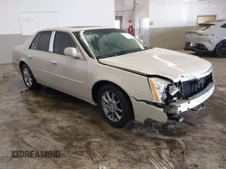 2011 Cadillac DTS Luxury Collection with VIN 1G6KD5E68BU151058, listed as a IAAI auction lot 41433526 with 118,815 mi miles and . Bid and sale history available at DreamBid. Image 1.