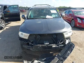 2014 Dodge Durango Limited with VIN 1C4RDHDG6EC277775, listed as a IAAI auction lot 42619740 with 206,936 mi miles and . Bid and sale history available at DreamBid. Image 6.