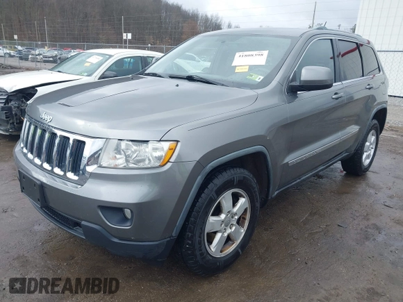 2012 Jeep Grand Cherokee Laredo with VIN 1C4RJFAGXCC118823, listed as a IAAI auction lot 41808398 with 153,509 mi miles. Bid and sale history available at carsss.com. Image 17.