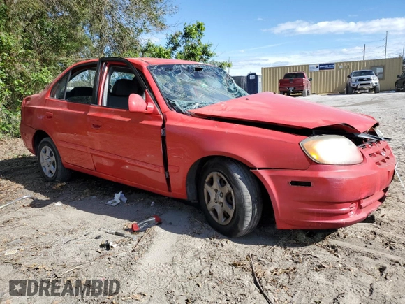 2005 Hyundai Accent GLS with VIN KMHCG45CX5U618473, listed as a Copart auction lot 76752994 with 0 mi miles and Salvage Title. Bid and sale history available at carsss.com. Image 4.