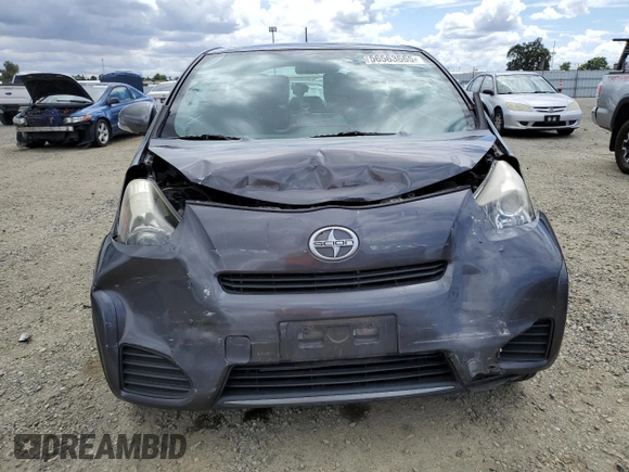 2012 Scion iQ z VIN JTNJJXB06CJ009187, wystawiony jako Copart lot #56563665 z przebiegiem 105 014 mil mil oraz Szkoda całkowita • Salvage title. Historia ofert i sprzedaży dostępna na DreamBid. Obrazek 5.