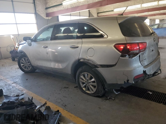 2019 Kia Sorento LX z VIN 5XYPG4A54KG480732, wystawiony jako Copart lot #87833135 z przebiegiem 102 219 mil mil oraz Szkody całkowita. Historia ofert i sprzedaży dostępna na DreamBid. Obrazek 2.