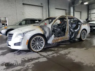 2015 Cadillac CTS Luxury AWD with VIN 1G6AX5SX2F0143051, listed as a Copart auction lot 54432315 with Not provided miles and Salvage title. Bid and sale history available at DreamBid. Image 1.