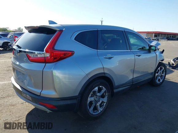 2017 Honda CR-V EX with VIN 7FARW1H54HE007644, listed as a IAAI auction lot 42076358 with 79,236 mi miles. Bid and sale history available at carsss.com. Image 4.