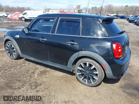 2017 MINI Hardtop 4 Door Cooper S z VIN WMWXU3C39H2F48699, wystawiony jako IAAI lot #41924423 z przebiegiem 81 249 mil mil oraz . Historia ofert i sprzedaży dostępna na DreamBid. Obrazek 3.
