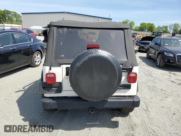 2005 Jeep Wrangler X with VIN 1J4FA39S75P332586, listed as a Copart auction lot 53334725 with 96,728 mi miles and Salvage title. Bid and sale history available at DreamBid. Image 6.