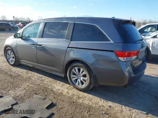 2016 Honda Odyssey EX-L with VIN 5FNRL5H67GB147335, listed as a IAAI auction lot 41115400 with 165,656 mi miles. Bid and sale history available at carsss.com. Image 3.