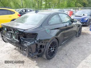 2021 BMW M2 Competition z VIN WBS2U7C05M7J18701, wystawiony jako IAAI lot #42256735 z przebiegiem 12 976 mil mil oraz . Historia ofert i sprzedaży dostępna na DreamBid. Obrazek 4.