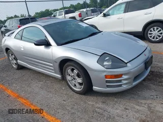2000 Mitsubishi Eclipse GT z VIN 4A3AC84L5YE103909, wystawiony jako IAAI lot #42425327 z przebiegiem 112 940 mil mil oraz . Historia ofert i sprzedaży dostępna na DreamBid. Obrazek 1.