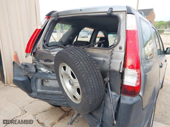 2006 Honda CR-V LX with VIN SHSRD68506U404787, listed as a IAAI auction lot 42001551 with 136,534 mi miles. Bid and sale history available at carsss.com. Image 13.