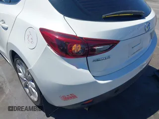 2015 Mazda 3 S Grand Touring with VIN JM1BM1M39F1233093, listed as a IAAI auction lot 42245609 with 137,487 mi miles and . Bid and sale history available at DreamBid. Image 6.