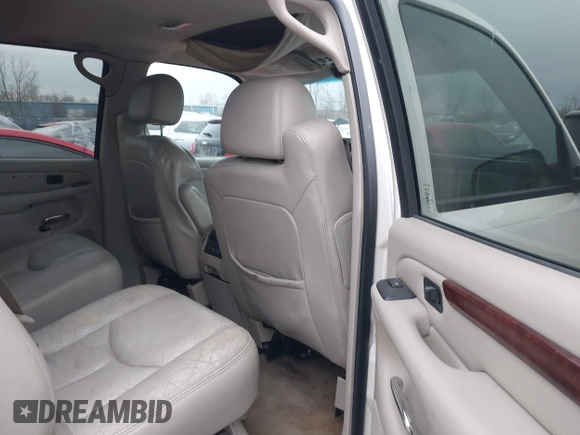 2005 Cadillac Escalade with VIN 1GYEK63NX5R121562, listed as a IAAI auction lot 41923728 with 242,610 mi miles and . Bid and sale history available at DreamBid. Image 8.