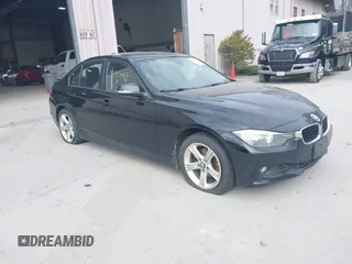 2013 BMW 3 Series 328i xDrive with VIN WBA3B5C55DF598940, listed as a IAAI auction lot 41828448 with 110,184 mi miles. Bid and sale history available at carsss.com. Image 1.