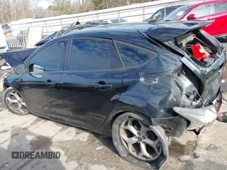 2014 Ford Focus ST with VIN 1FADP3L99EL147387, listed as a IAAI auction lot 41300582 with Not Provided miles and . Bid and sale history available at carsss.com. Image 14.