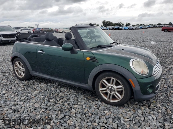 2012 MINI Convertible with VIN WMWZN3C50CT134069, listed as a Copart auction lot 56524155 with 106,480 mi miles and Clean title. Bid and sale history available at DreamBid. Image 4.