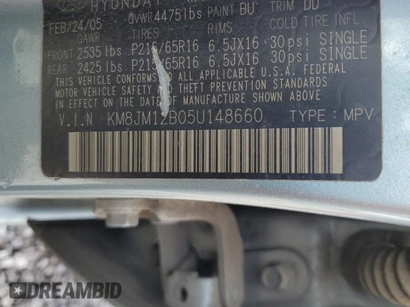 2005 Hyundai Tucson GL with VIN KM8JM12B05U148660, listed as a Copart auction lot 54302805 with 257,233 mi miles and Salvage title. Bid and sale history available at DreamBid. Image 13.