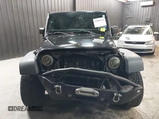 2015 Jeep Wrangler Unlimited Willys Wheeler with VIN 1C4BJWDG1FL749803, listed as a IAAI auction lot 41995132 with 156,595 mi miles and . Bid and sale history available at DreamBid. Image 13.