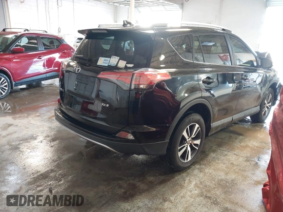 2018 Toyota RAV4 XLE with VIN 2T3WFREV1JW471931, listed as a IAAI auction lot 41332851 with 123,657 mi miles. Bid and sale history available at carsss.com. Image 4.