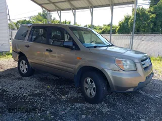 2006 Honda Pilot LX with VIN 2HKYF18146H551600, listed as a IAAI auction lot 39842919 with 133,188 mi miles. Bid and sale history available at carsss.com. Image 1.