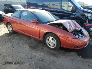2002 Saturn SC with VIN 1G8ZR12722Z165666, listed as a Copart auction lot 82907074 with 70,051 mi miles and Salvage Title. Bid and sale history available at carsss.com. Image 4.