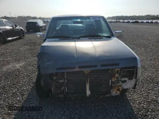 1995 Nissan Frontier XE z VIN 1N6HD16S2SC336866, wystawiony jako Copart lot #56041925 z przebiegiem 187 337 mil mil oraz Szkoda całkowita • Salvage title. Historia ofert i sprzedaży dostępna na DreamBid. Obrazek 5.