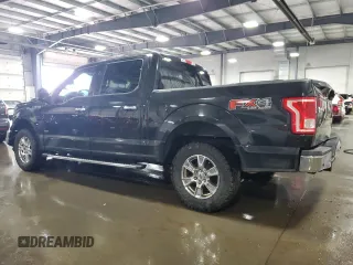 2015 Ford F-150 XLT with VIN 1FTEW1EGXFFB70128, listed as a Copart auction lot 50907155 with 152,504 mi miles and Salvage Title. Bid and sale history available at carsss.com. Image 2.