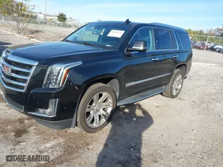 2018 Cadillac Escalade Luxury with VIN 1GYS3BKJ7JR291430, listed as a IAAI auction lot 41449233 with 128,281 mi miles. Bid and sale history available at carsss.com. Image 2.