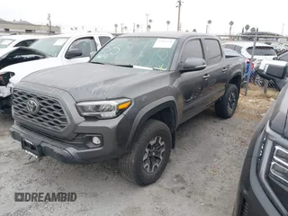 2023 Toyota Tacoma SR with VIN 3TMCZ5AN0PM635933, listed as a IAAI auction lot 42543126 with 32,960 mi miles and . Bid and sale history available at DreamBid. Image 23.