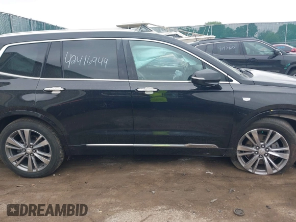 2020 Cadillac XT6 FWD Premium Luxury z VIN 1GYKPCRS6LZ148058, wystawiony jako IAAI lot #42416949 z przebiegiem 79 318 mil mil oraz . Historia ofert i sprzedaży dostępna na DreamBid. Obrazek 13.
