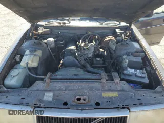 1993 Volvo 240 with VIN YV1AS8807P1483020, listed as a Copart auction lot 61060095 with 131,000 mi miles and Salvage title. Bid and sale history available at DreamBid. Image 11.