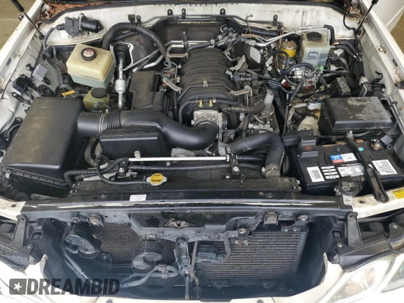 2006 Lexus LX 470 z VIN JTJHT00W464009295, wystawiony jako Copart lot #56724525 z przebiegiem 155 874 mil mil oraz Szkoda całkowita • Salvage title. Historia ofert i sprzedaży dostępna na DreamBid. Obrazek 12.