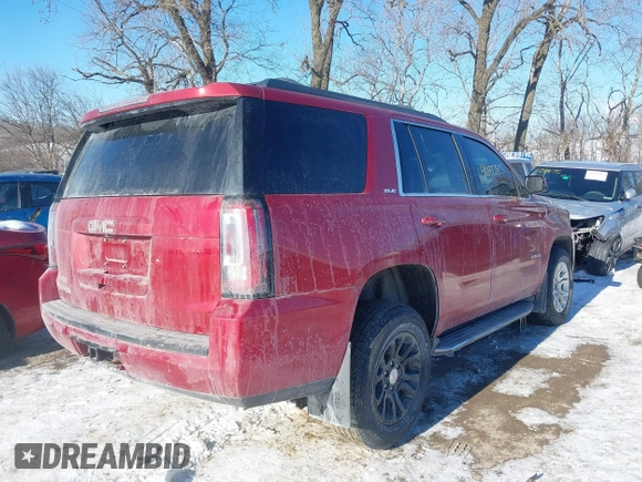 2015 GMC Yukon SLE with VIN 1GKS2AKC2FR514005, listed as a IAAI auction lot 41292783 with 129,413 mi miles. Bid and sale history available at carsss.com. Image 4.