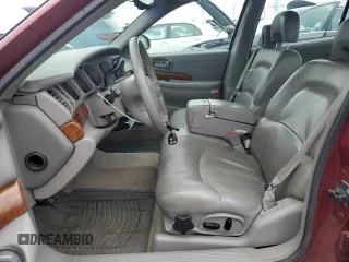 2001 Buick LeSabre Limited z VIN 1G4HR54K11U297397, wystawiony jako Copart lot #63973525 z przebiegiem 131 629 mil mil oraz Czysty tytuł • Clean title. Historia ofert i sprzedaży dostępna na DreamBid. Obrazek 7.