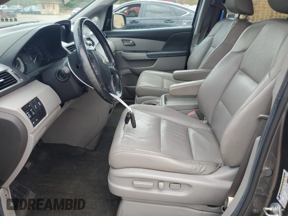 2012 Honda Odyssey Touring with VIN 5FNRL5H90CB050580, listed as a Copart auction lot 58502925 with 226,929 mi miles and Salvage title. Bid and sale history available at DreamBid. Image 7.