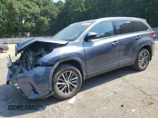 2019 Toyota Highlander SE with VIN 5TDJZRFH0KS740479, listed as a Copart auction lot 62574865 with 105,929 mi miles and Salvage title. Bid and sale history available at DreamBid. Image 1.