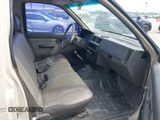 1986 Nissan Hardbody E with VIN JN6ND11S0GW000696, listed as a IAAI auction lot 42358321 with 445,199 mi miles and . Bid and sale history available at DreamBid. Image 5.