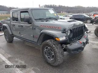 2022 Jeep Gladiator Mojave with VIN 1C6JJTEG8NL130971, listed as a IAAI auction lot 41163074 with 47,142 mi miles and . Bid and sale history available at DreamBid. Image 1.