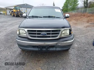 1999 Ford F-150 with VIN 1FTRX17W5XNA06036, listed as a IAAI auction lot 41897561 with 222,979 mi miles and . Bid and sale history available at DreamBid. Image 12.